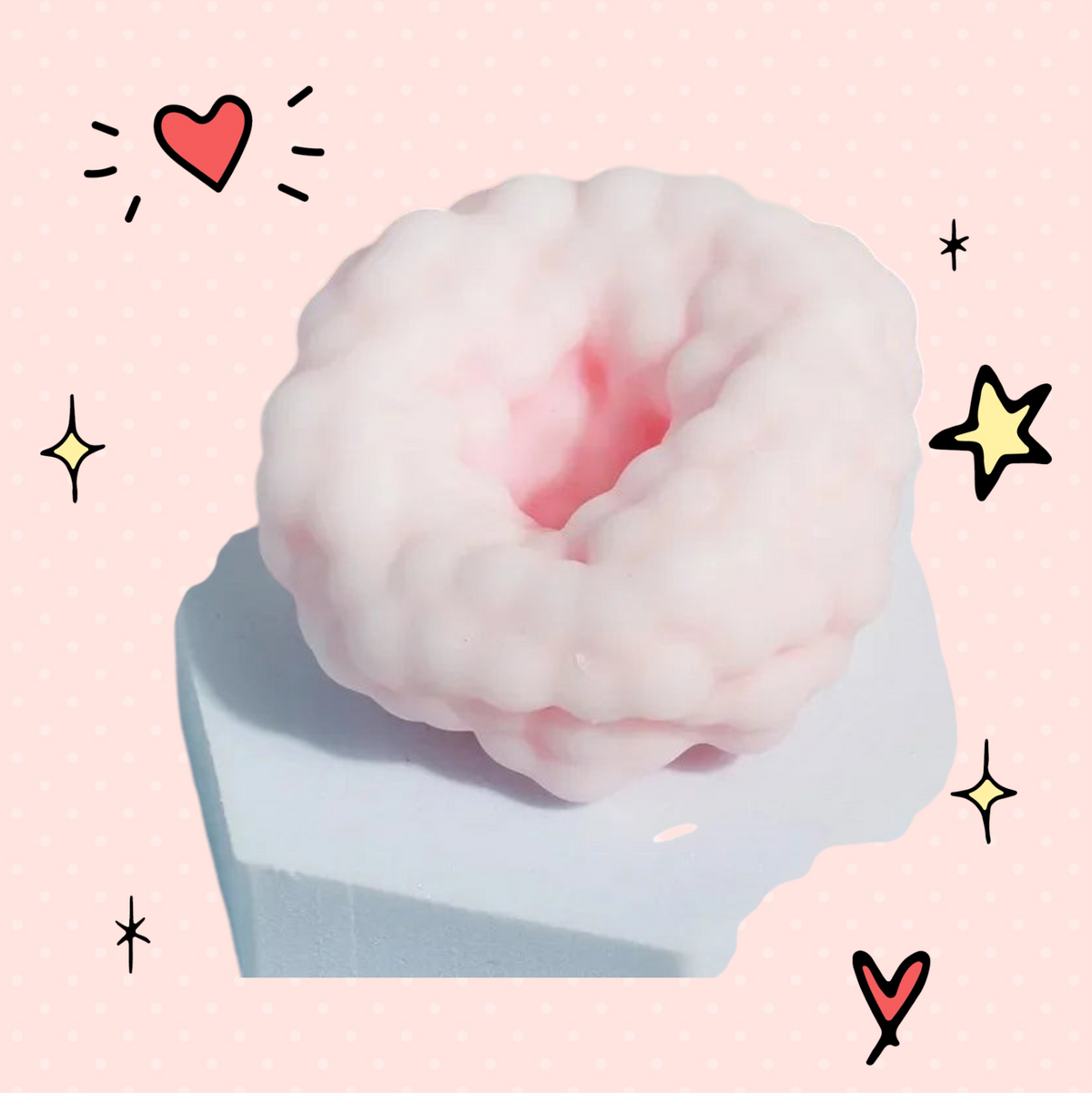 Foundry FitFit pink donut-shaped sensory stress ball with a textured surface for tactile anxiety relief