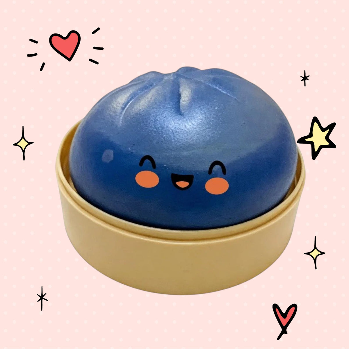 Foundry FitFit blue dumpling squishy toy with a cute smiling face in a small beige steamer basket