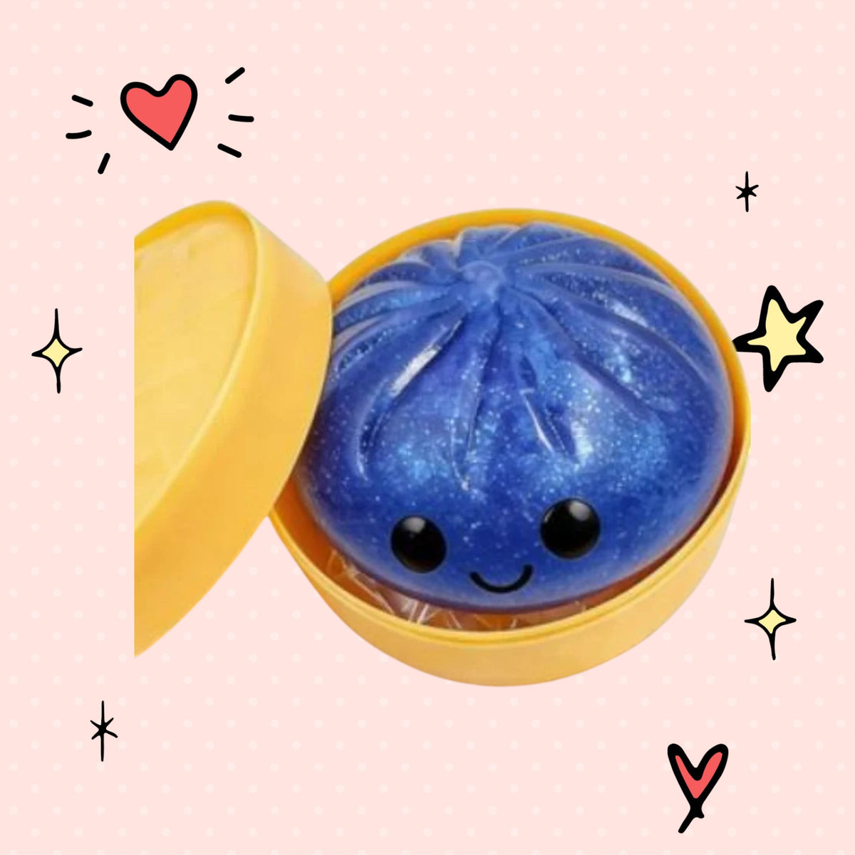 Foundry FitFit blue glittery dumpling squishy toy with a cute smiling face inside a yellow container