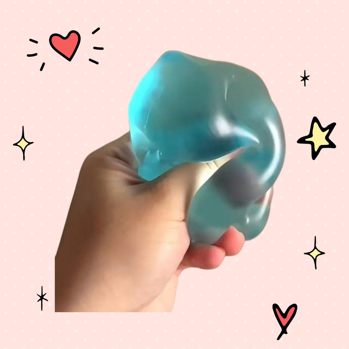 Foundry FitFit blue transparent squishy ball being squeezed in a hand for stress relief and sensory play