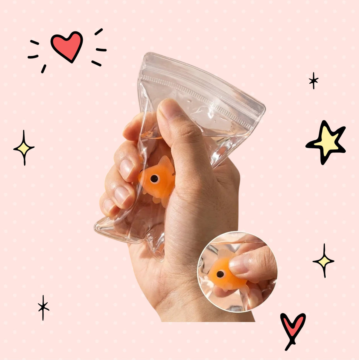Foundry FitFit Pet Goldfish Sweet Squishy toy made of soft TPR material being squeezed for stress relief