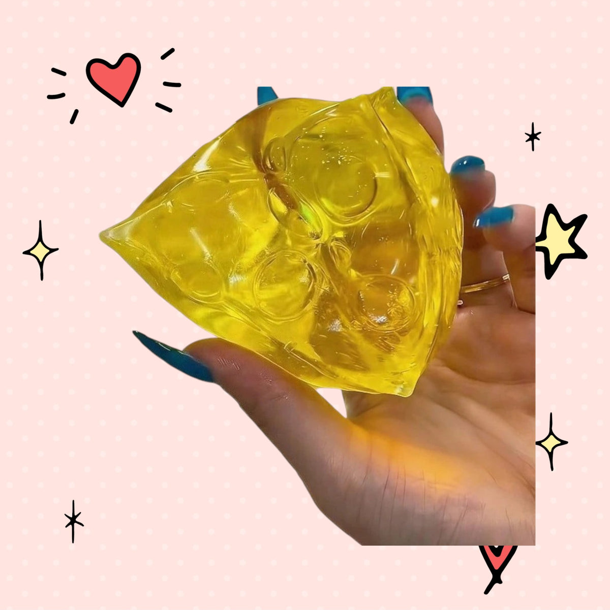 Foundry FitFit yellow cheese wedge squishy toy made of soft slow-rise foam held in a hand for stress relief