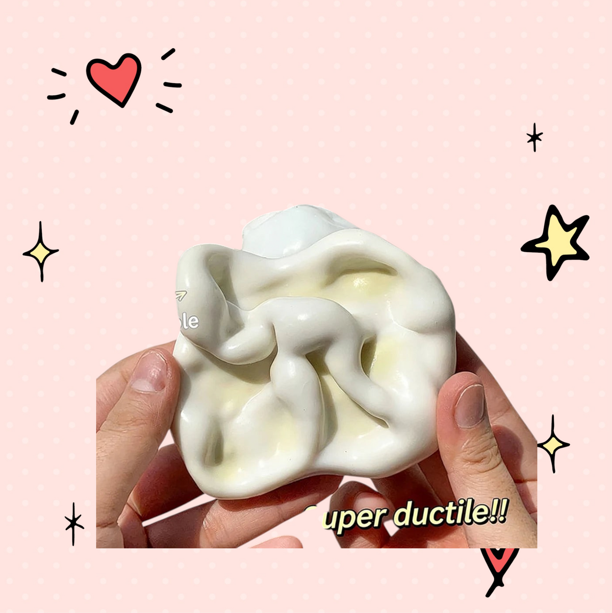 Foundry FitFit white glutinous sand fidget ball being stretched and shaped by hands for stress relief