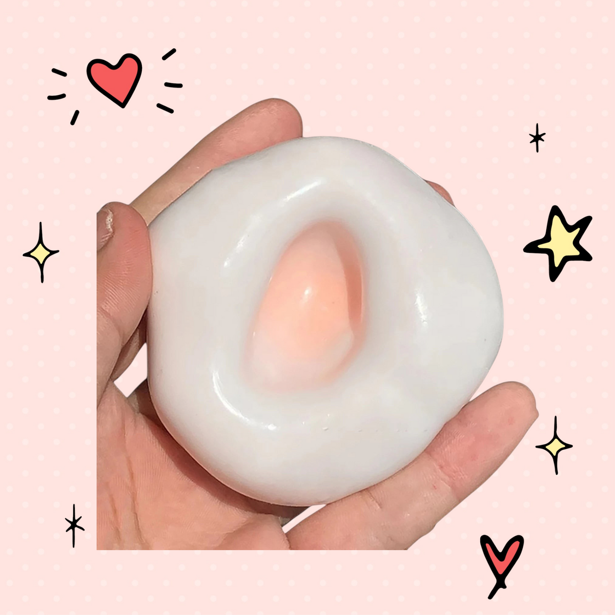 Foundry FitFit white glutinous sand stress ball held in hand for sensory anxiety relief and tactile squeezing