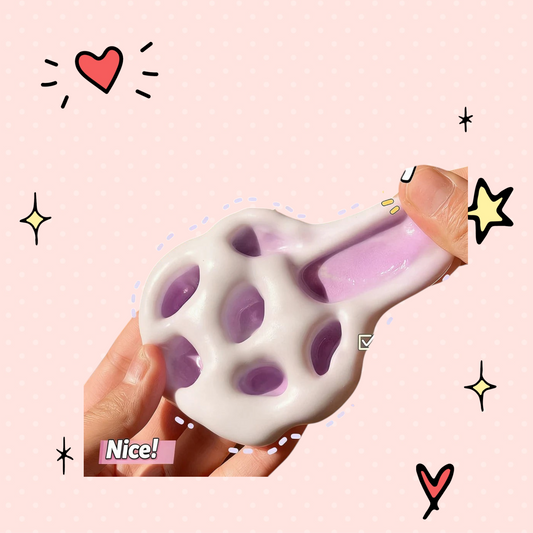Foundry FitFit purple and white glutinous rice ball squishy toy being stretched by hand for stress relief