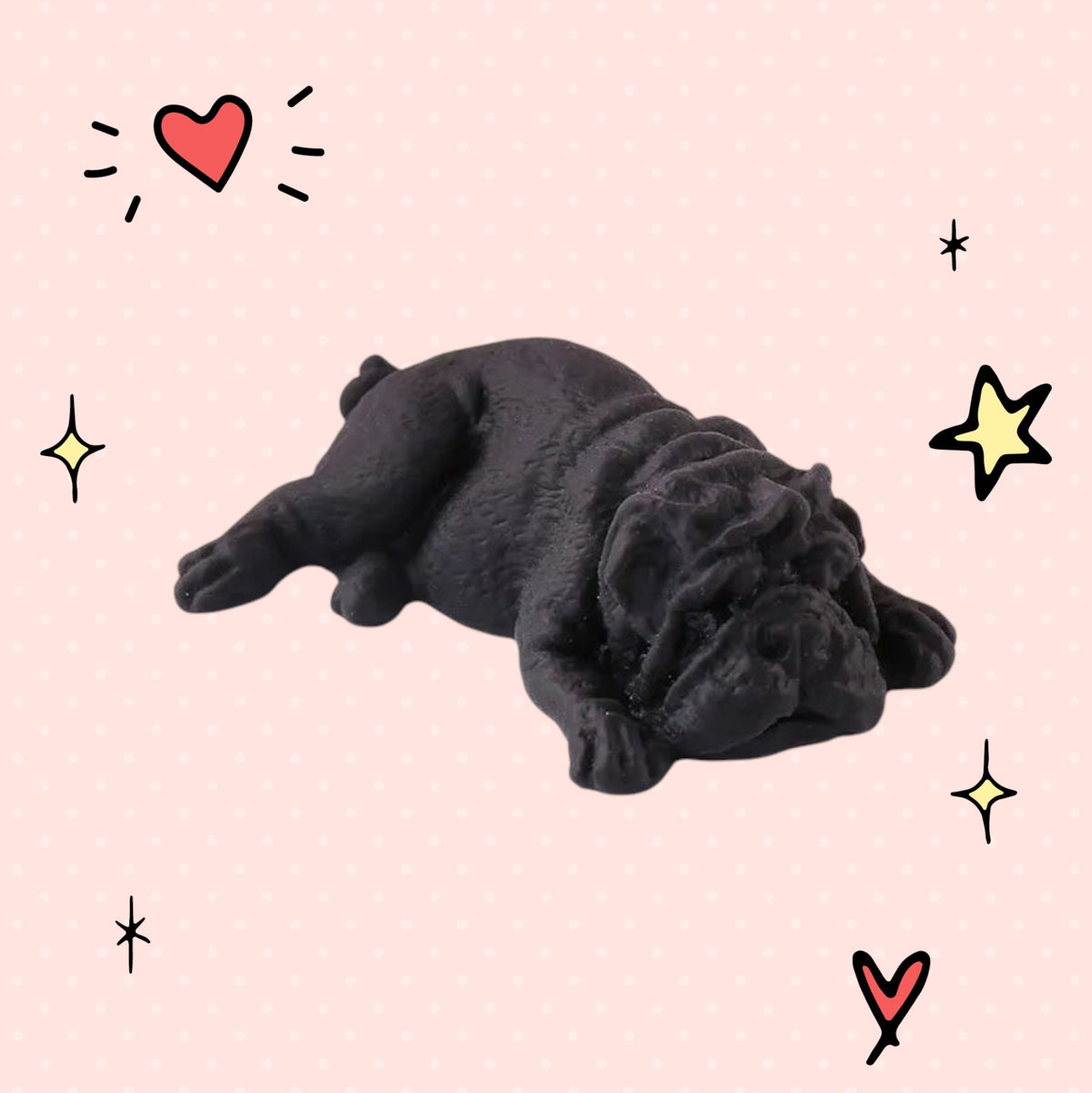 Foundry FitFit black sleepy puppy squishy toy with a soft slow-rise texture and kawaii design on a pink background