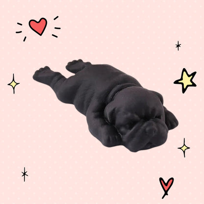 Foundry FitFit black puppy squishy toy with a sleepy kawaii design and soft slow-rise texture for sensory play