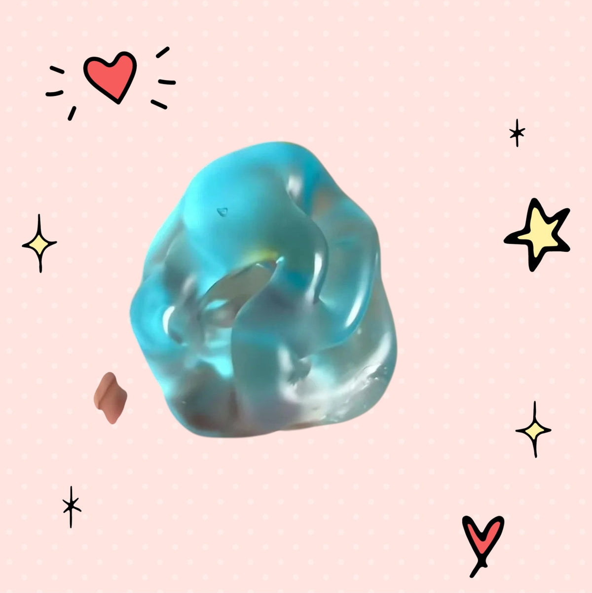 Foundry FitFit blue transparent squishy ball with a jelly-like texture being held in a hand for sensory stress relief