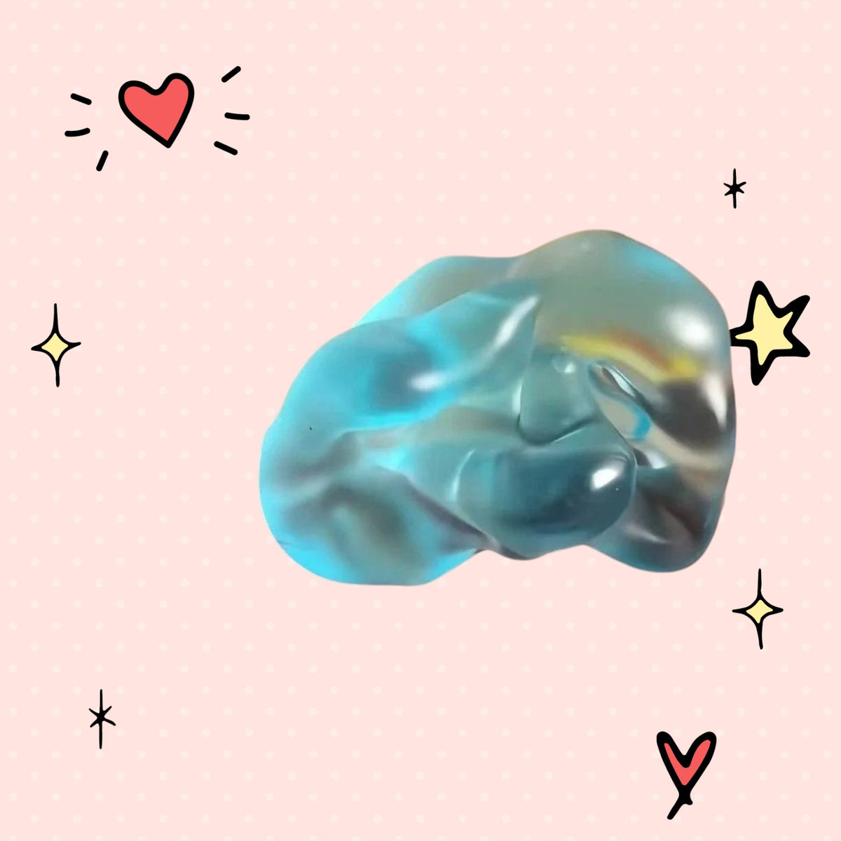Foundry FitFit blue transparent squishy stress ball with a jelly-like texture on a pink dotted background