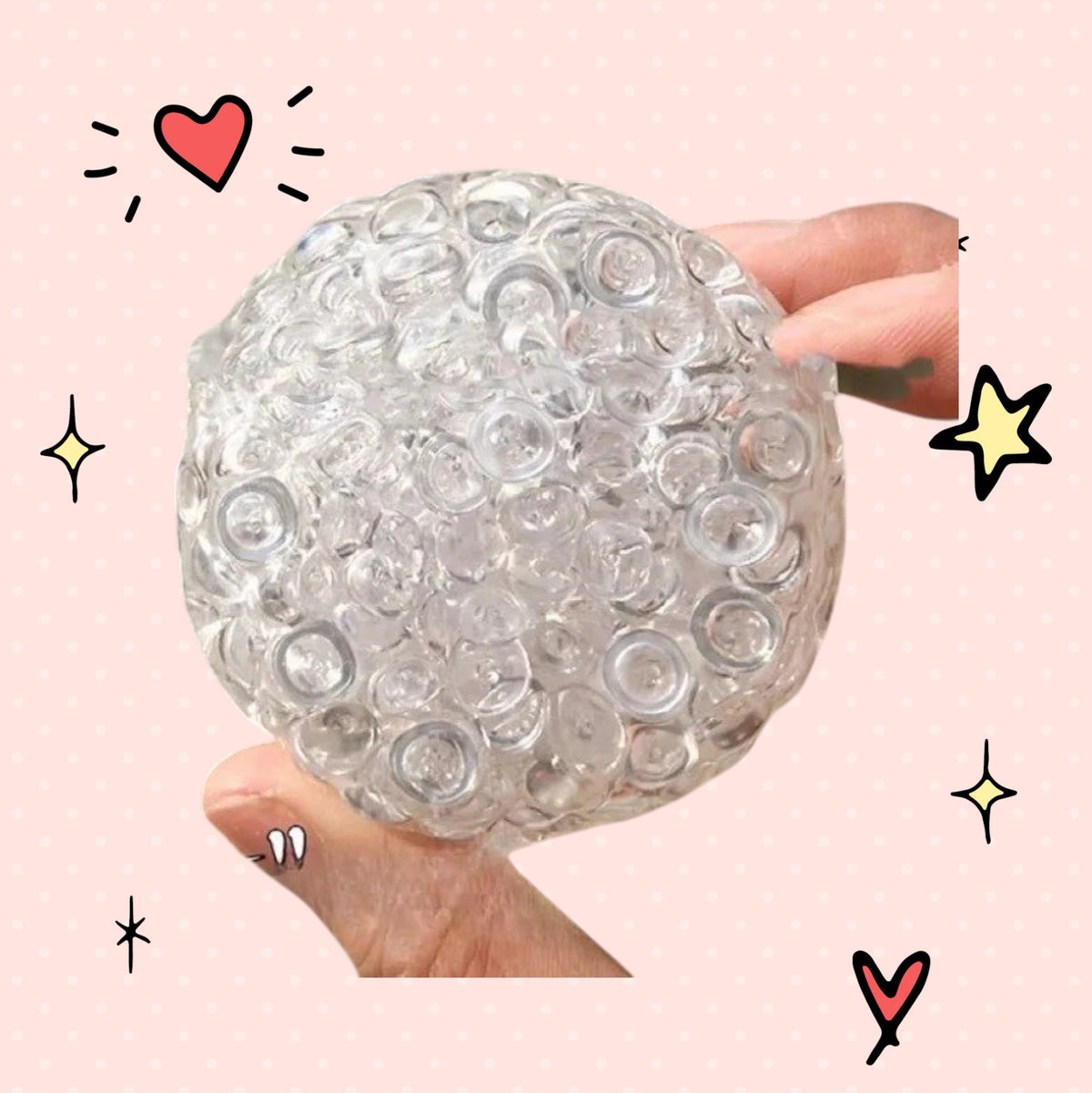Foundry FitFit clear squishy ice-bead sensory ball held in hands for stress relief and fidgeting