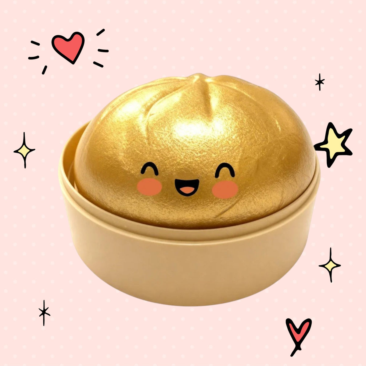 Foundry FitFit gold dumpling squishy toy with a cute smiling face in a small round container