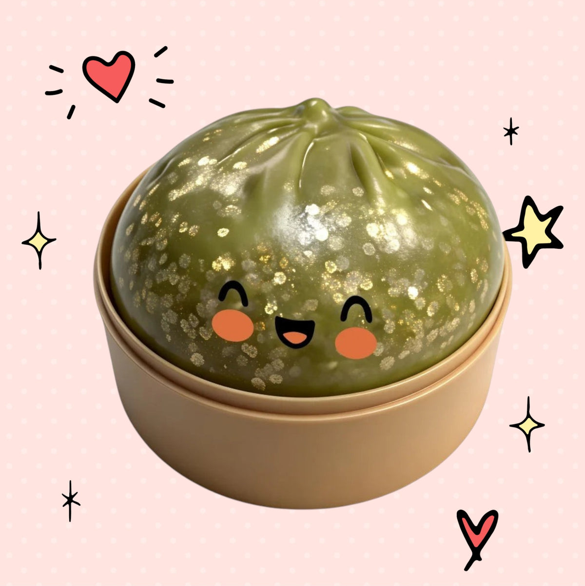 Foundry FitFit green dumpling squishy toy with gold glitter and a cute smiling face in a beige container.