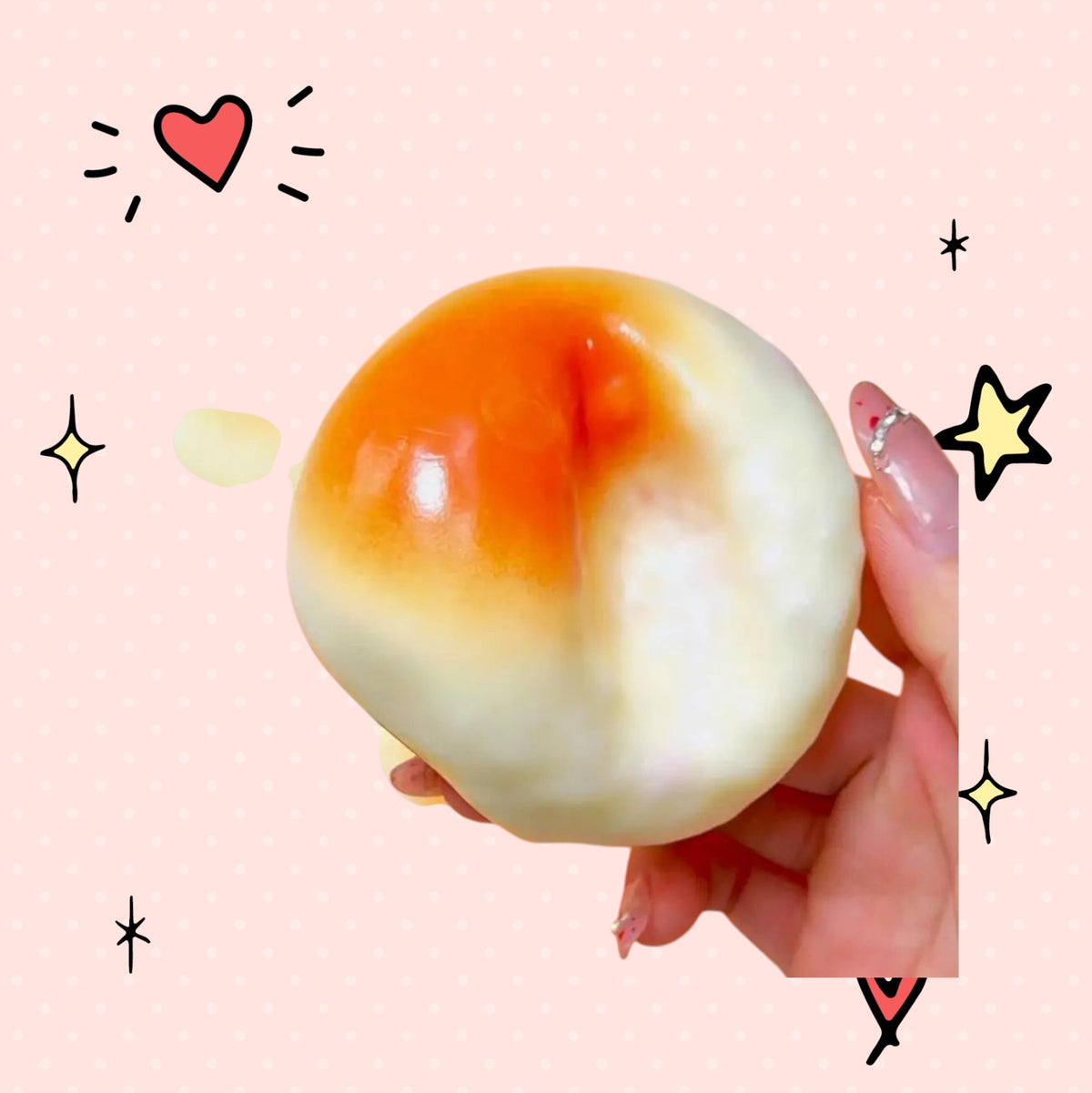 Foundry FitFit honey bread squishy toy with orange and white pastry design held in hand for stress relief