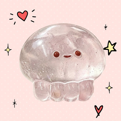 Foundry FitFit transparent pink jellyfish squishy stress toy with a cute smiling face and soft TPR material