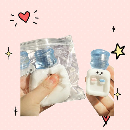 Foundry FitFit mini water cooler squishy stress relief toy with a cute face, made of soft squeezable TPR material.