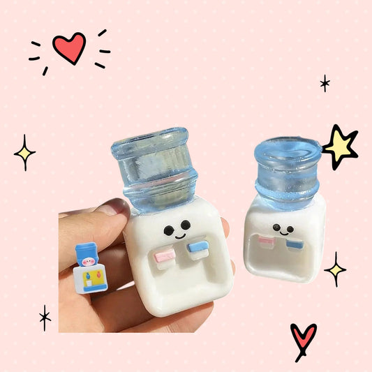 Foundry FitFit mini water cooler squishy fidget toys with cute smiling faces made of soft white and blue TPR material