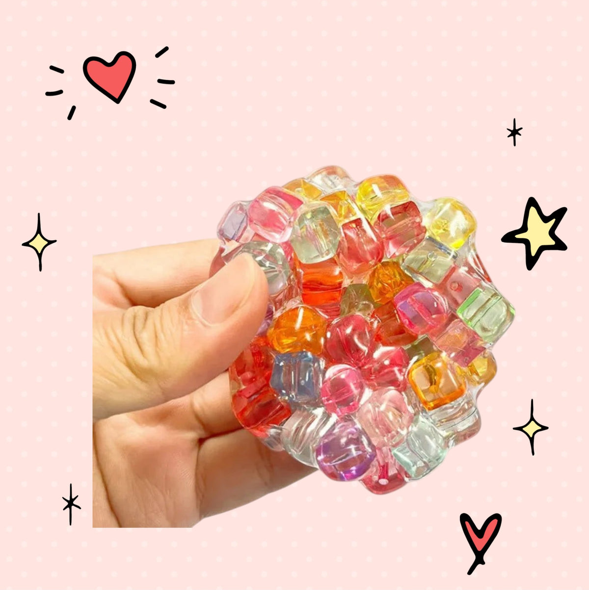 Foundry FitFit multi-colored gel bead squishy ball held in hand for sensory stress relief and fidgeting