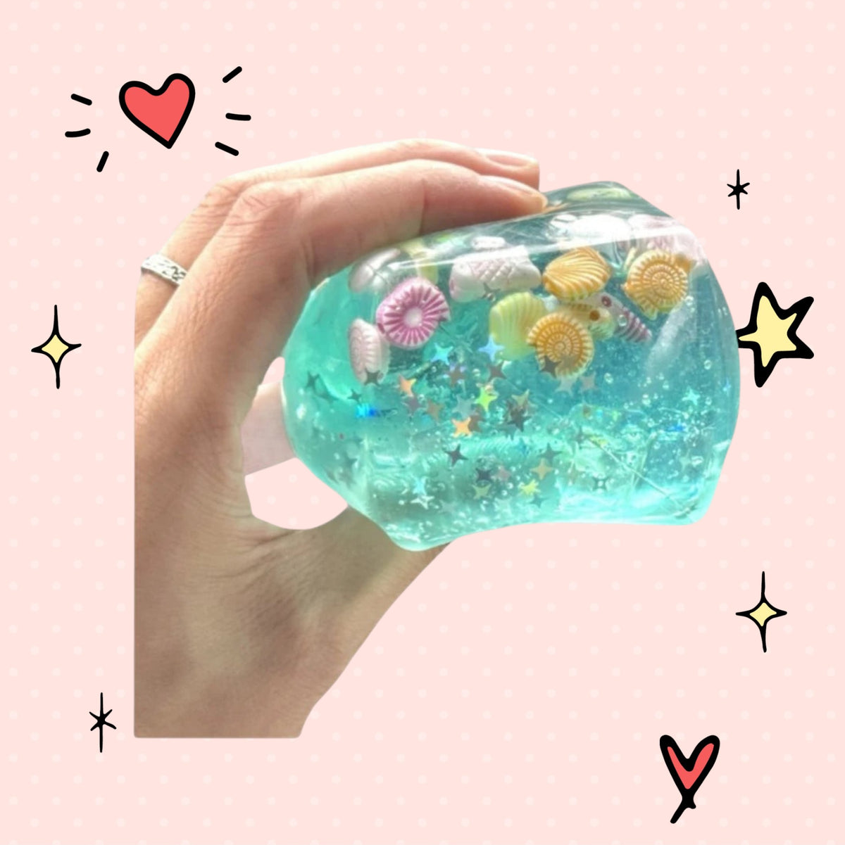 Foundry FitFit ocean-themed squishy cube filled with crystal soil, seashells, and stars for sensory fidget play.
