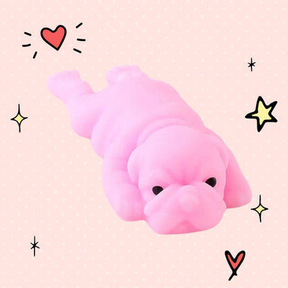 Foundry FitFit pink puppy squishy toy with a sleepy kawaii expression on a light pink background with doodle stars