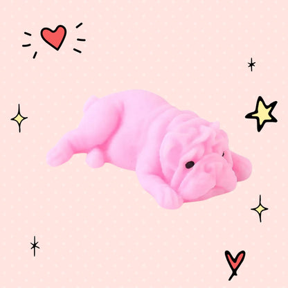 Foundry FitFit pink puppy squishy toy with a sleepy kawaii expression on a dotted background with hand-drawn stars