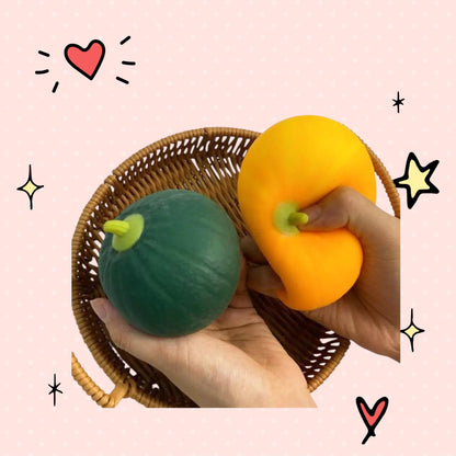 Foundry FitFit Spooky Pumpkin Patch squishy toys in green and yellow being squeezed in a woven basket