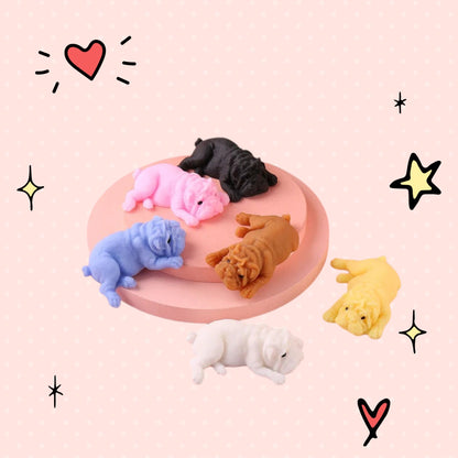 Foundry FitFit set of six colorful kawaii puppy squishy toys in various poses on a pink platform