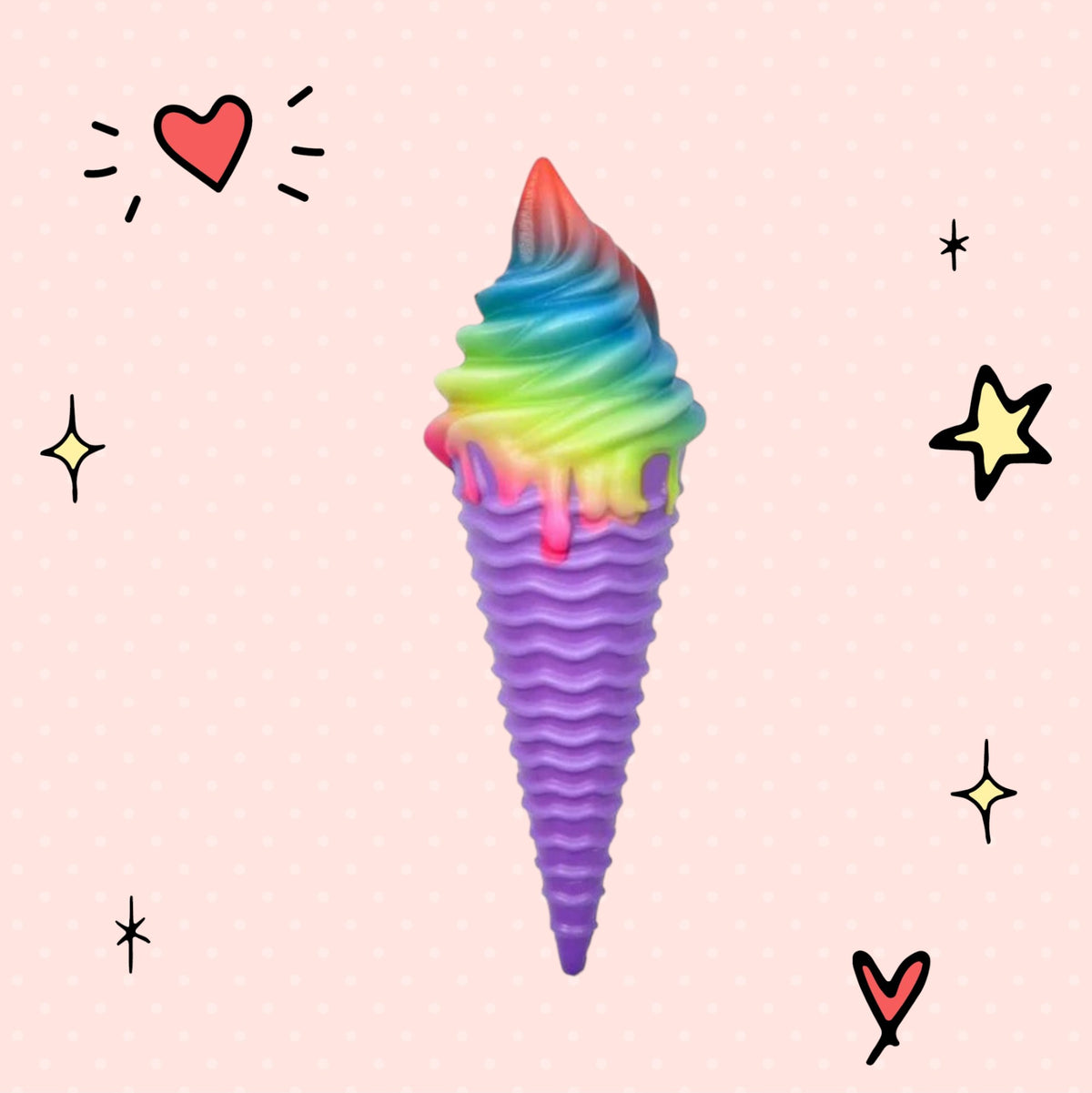 Foundry FitFit rainbow soft-serve ice cream squishy toy for stress relief on a pink polka dot background.