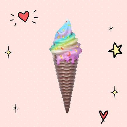 Foundry FitFit rainbow soft-serve ice cream squishy toy with sprinkles and a brown textured cone for stress relief.