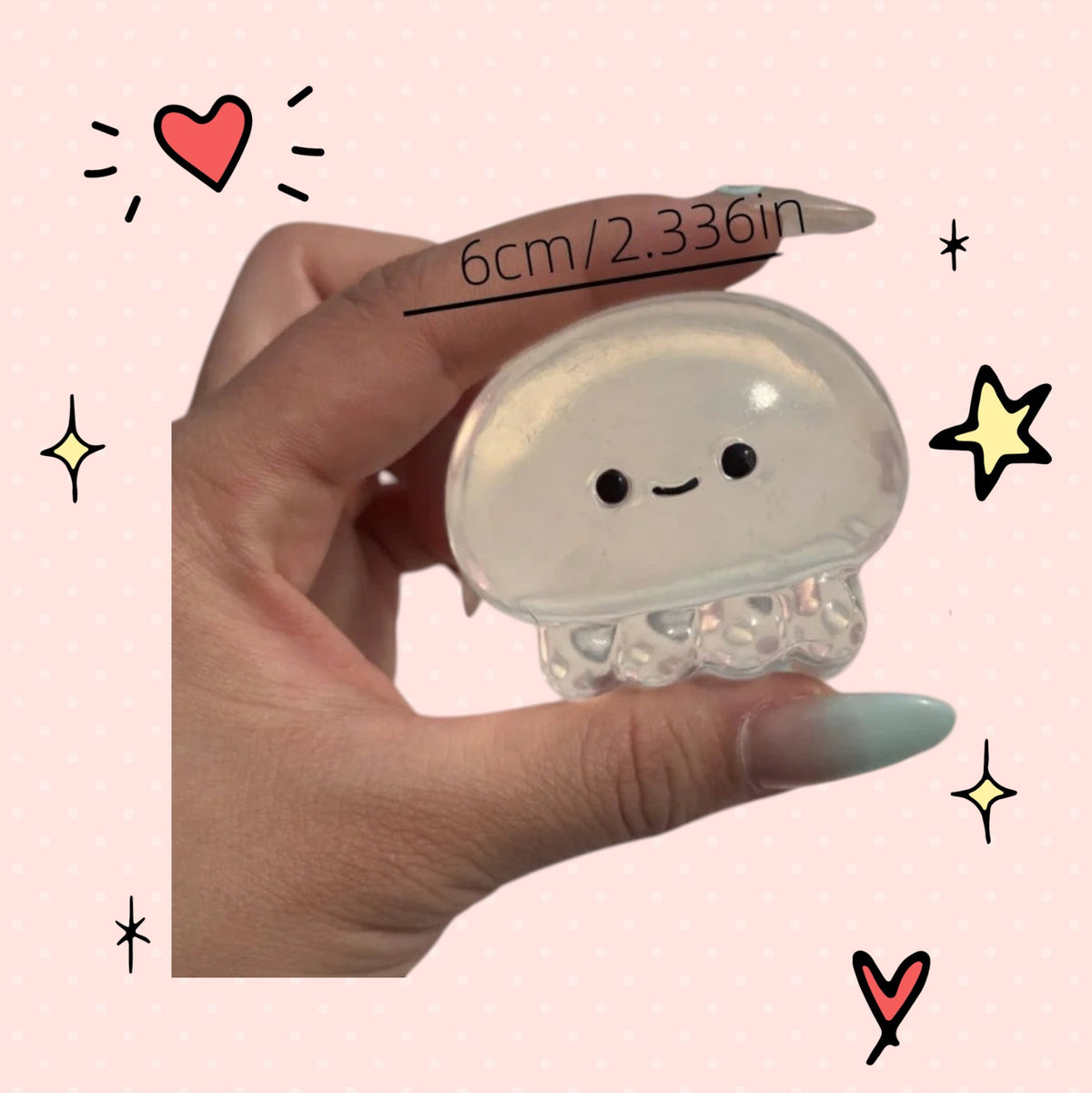 Foundry FitFit transparent jellyfish squishy toy for stress relief held in hand against a pink background