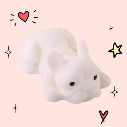 Foundry FitFit white puppy squishy toy with a sleepy kawaii expression on a light pink background with doodle stars