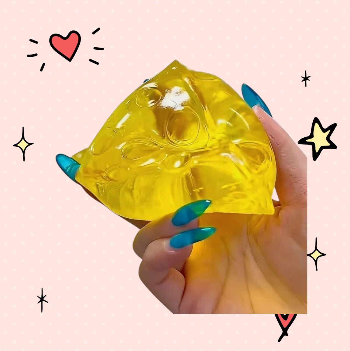 Foundry FitFit yellow translucent cheese wedge squishy toy being held in a hand for stress relief