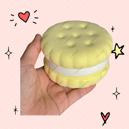 Foundry FitFit yellow sandwich-shaped squishy toy with a soft slow-rise foam texture held in a hand