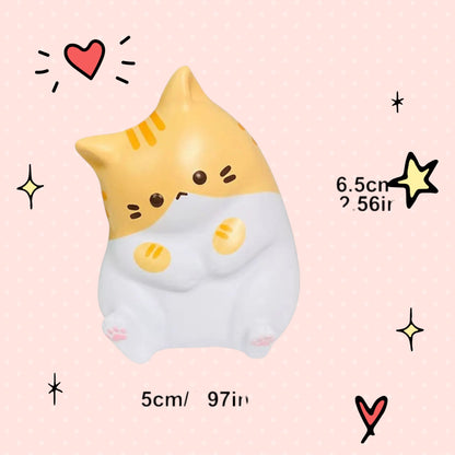Foundry FitFit yellow and white cartoon cat squishy toy for stress relief and fidgeting